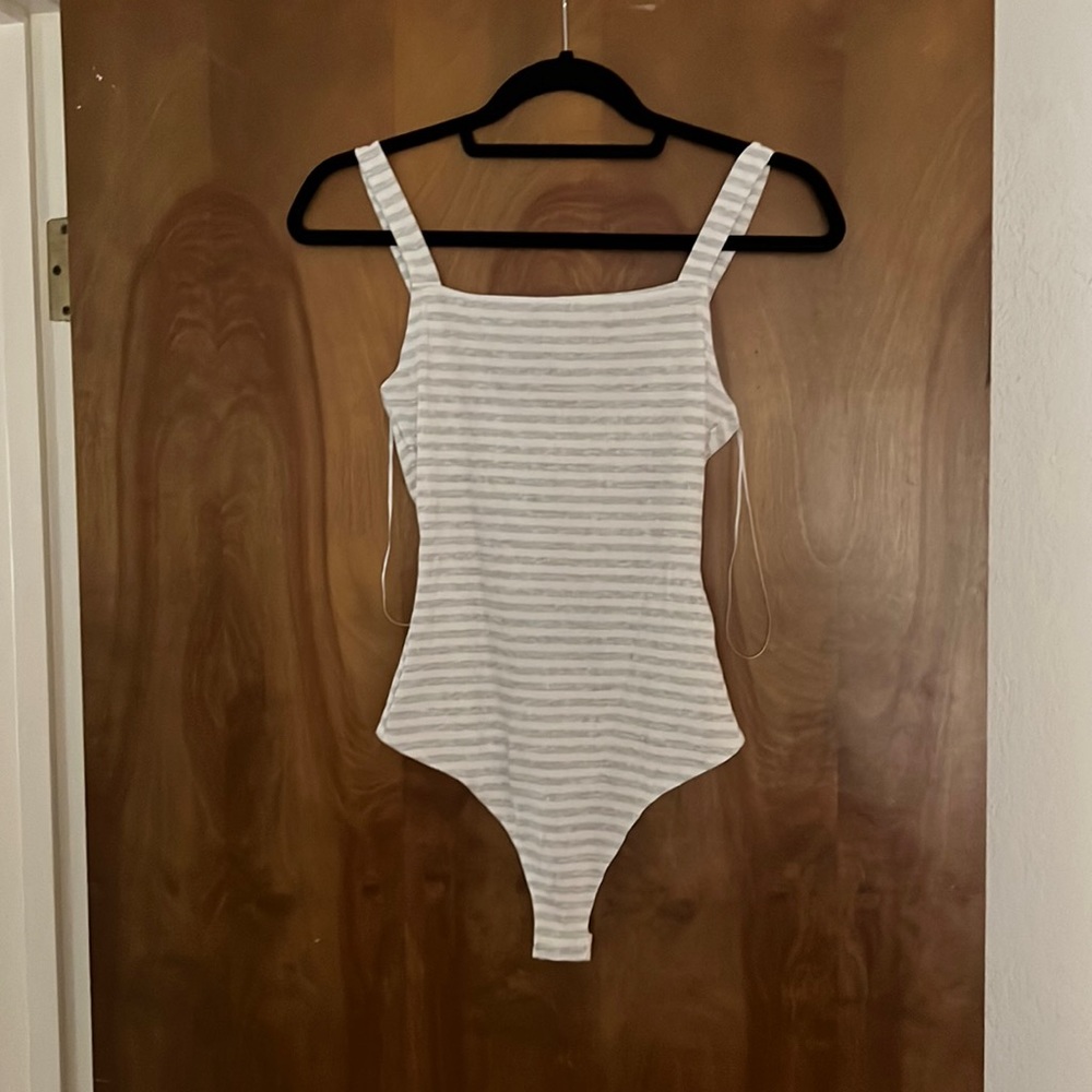 Bodysuit stripped.